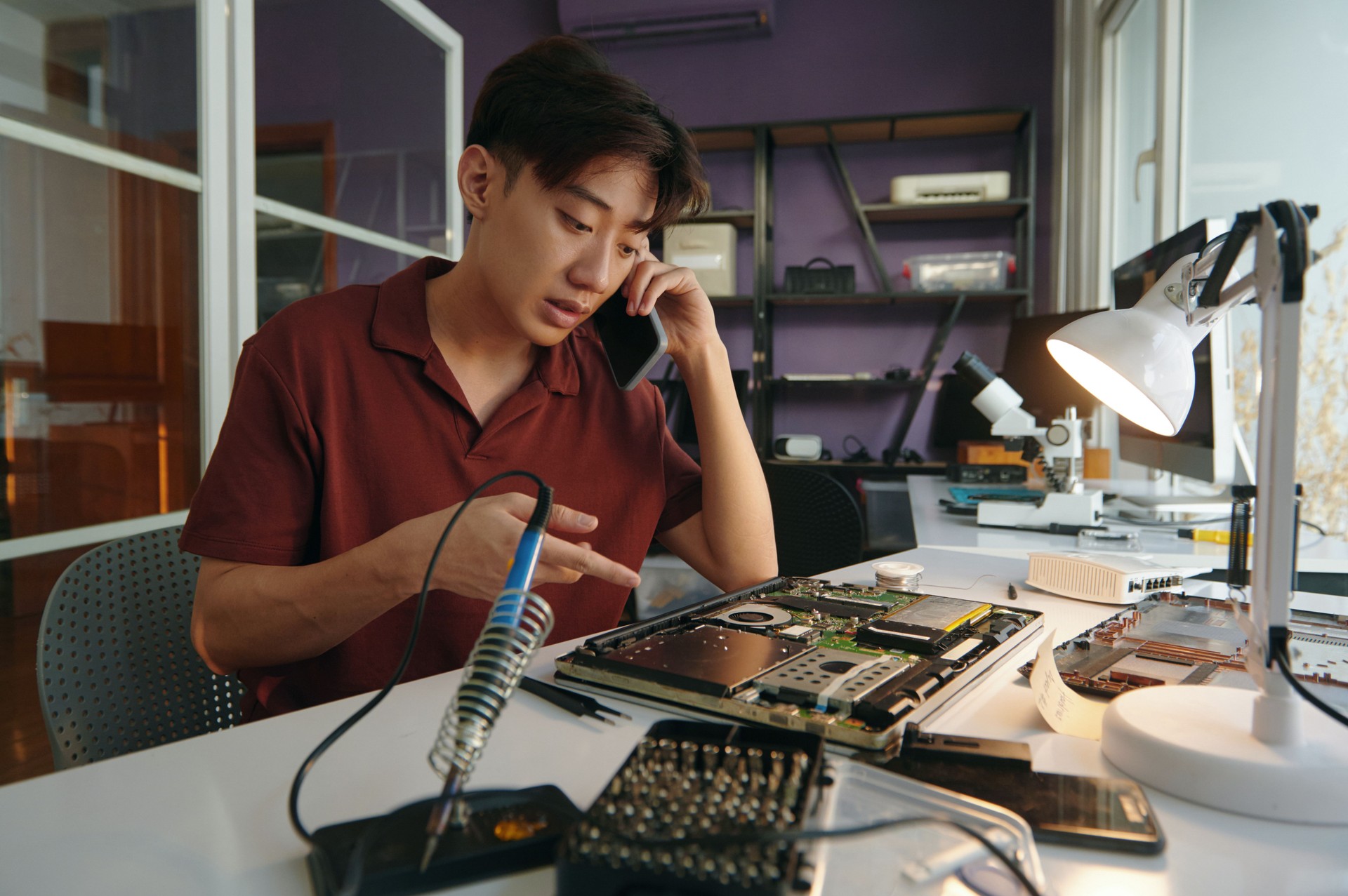 Repairman Discussing Repair With Customer